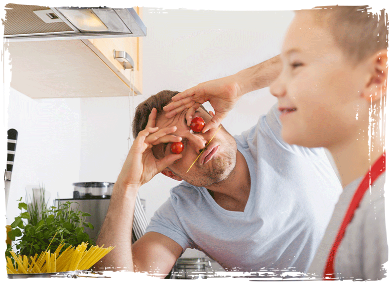 Vater und Kind beim Kochen